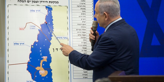 RAMAT GAN, ISRAEL - SEPTEMBER 10: Israeli Prime Minster Benjamin Netanyahu points to a Jordan Valley map during his announcement on September 10, 2019 in Ramat Gan, Israel. 