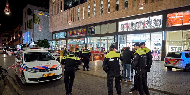Dutch police blocked a shopping street after a stabbing incident in the center of The Hague, Netherlands, on Friday. (AP Photo/Phil Nijhuis)
