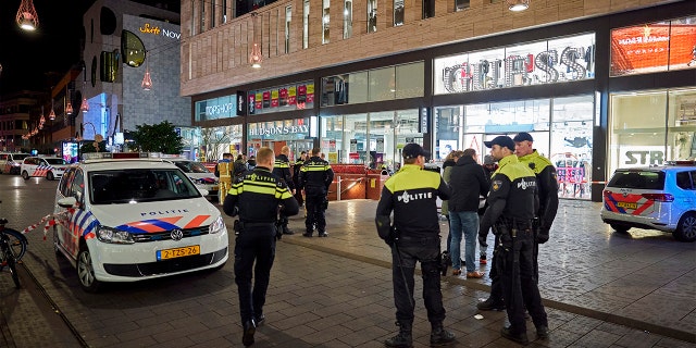 Dutch police blocked a shopping street after a stabbing incident in the center of The Hague, Netherlands, on Friday. (AP Photo/Phil Nijhuis)