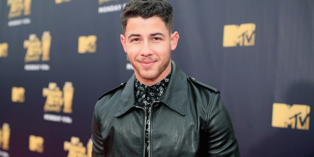 Nick Jonas attends the 2018 MTV Movie And TV Awards at Barker Hangar on June 16, 2018 in Santa Monica, Calif. (Photo by Christopher Polk/Getty Images for MTV)