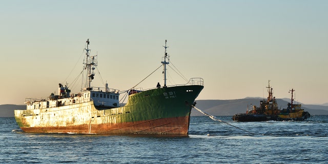A file picture of a North Korean fishing boat. Officials said that two North Korean fishermen were deported from South Korea after investigators found they killed their crewmembers and dumped their bodies at sea before fleeing and seeking asylum.