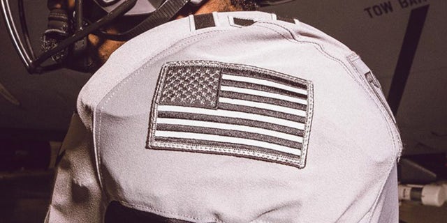 The American flag is sewn into the left sleeve of the jerseys.