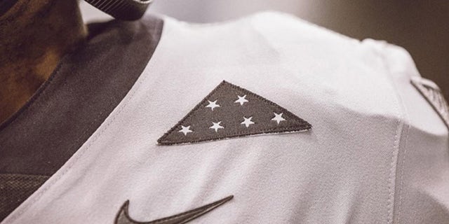 To honor fallen service members, a Folds of Honor logo will be worn on each helmet and jersey of the players -- below the shoulder and a few inches above the heart.