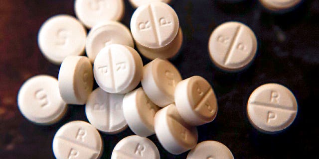 Oxycodone 5 mg pills. At least half a dozen companies that make or distribute prescription opioid pain relievers are facing a federal criminal investigation for their role in a national addiction and overdose crisis.