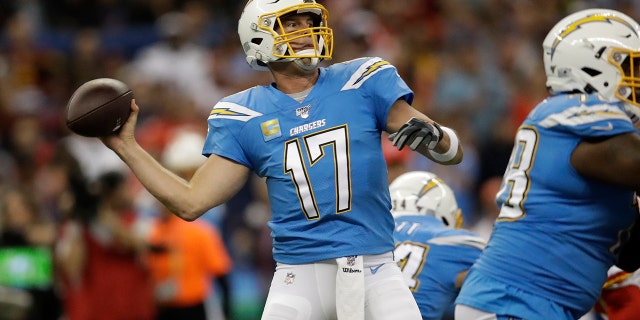 Los Angeles Chargers quarterback Philip Rivers throws a pass during the first half of an NFL football game against the Kansas City Chiefs Monday, Nov. 18, 2019, in Mexico City.