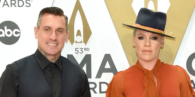 P!nk and Carey Hart attend the 53rd annual CMA Awards at the Music City Center on November 13, 2019 in Nashville, Tennessee