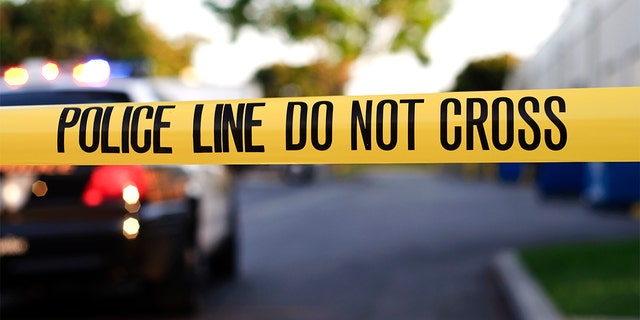 Police crime tape (Photo by iStock via Getty Images)