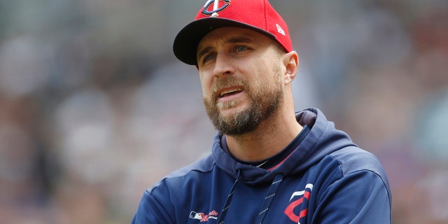 FILE - In this May 11, 2019, file photo, Minnesota Twins manager Rocco Baldelli looks up during the team's baseball game against the Detroit Tigers in Minneapolis. Baldelli has narrowly beaten out Aaron Boone of the New York Yankees to win AL Manager of the Year. (AP Photo/Jim Mone, File)