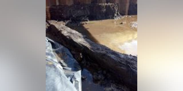 A piece of timber, which may have been used in an ancient construction project, was found at the excavation site.(Ebbsfleet Development Corporation)