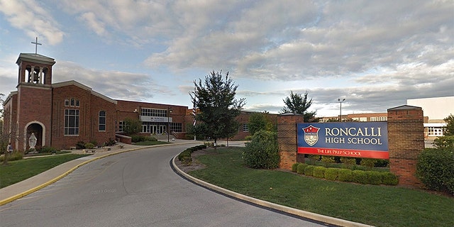 The four athletes from Roncalli High School in Indianapolis are accused of forcing the boy to lick another student's nipple in the locker room before the game, which she says has changed her son "forever."