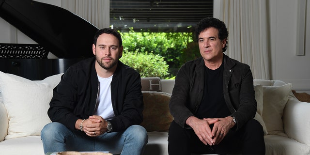 Scooter Braun and Scott Borchetta pose for a photo at a private residence on June 28, 2019 in Montecito, California. (Photo by Kevin Mazur/Getty Images for Ithaca Holdings)