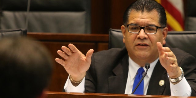 Illinois State Sen. Martin Sandoval, chairman of the Illinois Senate Transportation Committee, asks questions to attorneys during a 2014 hearing on March 13, 2014. (Antonio Perez/Chicago Tribune/Tribune News Service via Getty Images)