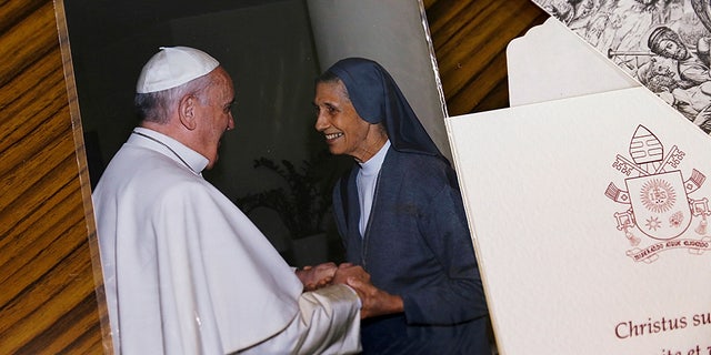 A picture of Pope Francis and Sister Ana Rosa Sivori is seen at the St. Mary School in Udon Thani province, Thailand, September 24, 2019. REUTERS/Jiraporn Kuhakan NO RESALES.
