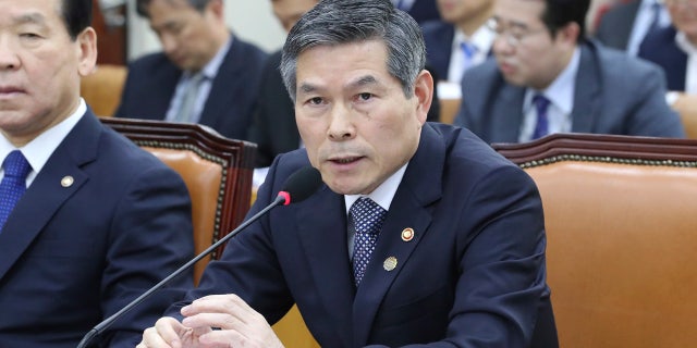 South Korean Defense Minister Jeong Kyeong-doo answers a lawmaker's question about North Koreans' deportation during a defense committee meeting at the National Assembly in Seoul, South Korea, Thursday, Nov. 7, 2019.