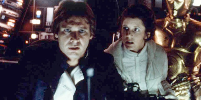 Harrison Ford and Carrie Fisher on the set of