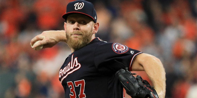 Washington Nationals starting pitcher Stephen Strasburg throwing against the Houston Astros during the first inning of Game 6 on Oct. 29 in Houston. (AP Photo/Mike Ehrmann, Pool)