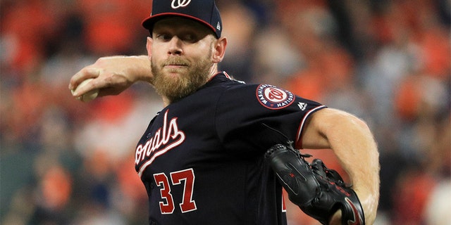 Washington Nationals starting pitcher Stephen Strasburg throwing against the Houston Astros during the first inning of Game 6 on Oct. 29 in Houston. (AP Photo/Mike Ehrmann, Pool)