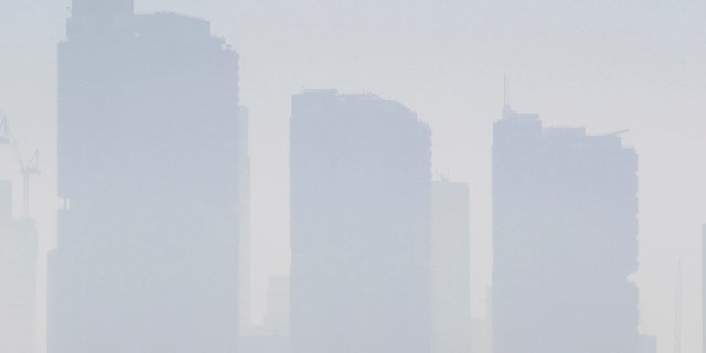 Smoke haze covers Sydney, Tuesday, Nov. 19, 2019, as wildfires burn near the city.