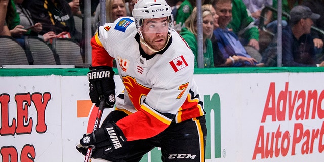 Calgary Flames defenseman T.J. Brodie (7) in action during the game between the Stars and the Flames at the American Airlines Center. Mandatory Credit: Jerome Miron-USA TODAY Sports - 13517167