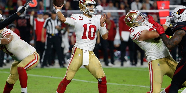 San Francisco 49ers quarterback Jimmy Garoppolo (10) throws against the Arizona Cardinals during the second half of an NFL football game, Thursday, Oct. 31, 2019, in Glendale, Ariz. (Associated Press)
