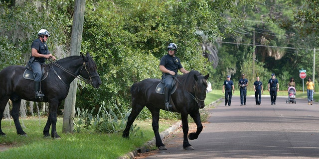 Mounted police join firefighters in Jacksonville in the search for 5-year-old Taylor Rose Williams who went missing around midnight Wednesday, November 6, 2019 in Jacksonville, Florida. 