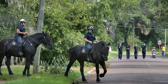 Mounted police join firefighters in Jacksonville in the search for 5-year-old Taylor Rose Williams who went missing around midnight Wednesday, November 6, 2019 in Jacksonville, Florida. 