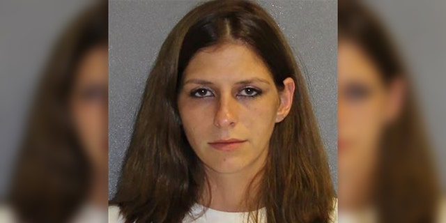 Tiffany Smith, 28, was revived and charged with child neglect after she overdosed on heroin while driving with her three children on a highway in Volusia County, Florida, investigators said.