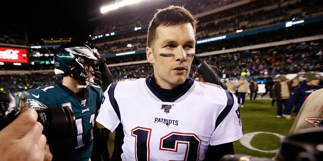 New England Patriots' Tom Brady walks the field after an NFL football game against the Philadelphia Eagles, Sunday, Nov. 17, 2019, in Philadelphia. New England won 17-10. (AP Photo/Michael Perez)