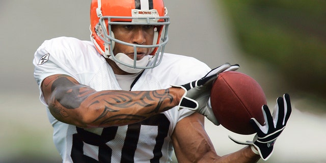 In 2006, Kellen Winslow Jr. catches a pass during practice in Berea, Ohio.  (AP Photo/Mark Duncan, File)