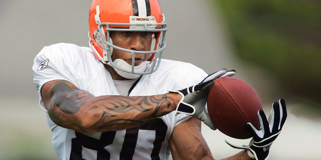 In 2006, Kellen Winslow Jr. catches a pass during practice in Berea, Ohio. (AP Photo/Mark Duncan, File)