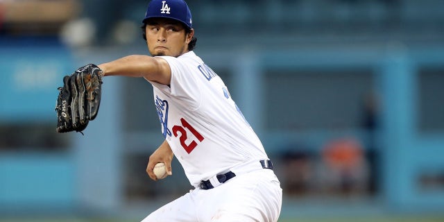 Yu Darvish #21 of the Los Angeles Dodgers pitches during Game 7 of the 2017 World Series against the Houston Astros at Dodger Stadium on Wednesday, Nov. 1, 2017 in Los Angeles. (Rob Tringali/MLB via Getty Images)