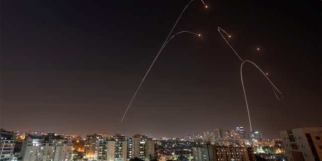 Israel's Iron Dome anti-missile system fires interception missiles, as seen from the city of Ashkelon Wednesday.