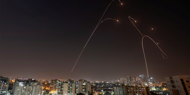 Israel's Iron Dome anti-missile system fires interception missiles, as seen from the city of Ashkelon Wednesday. 