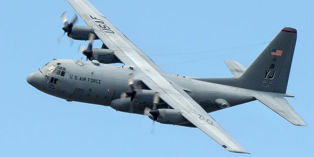 A U.S. Air Force C-130 Hercules aircraft flies over Yokota Air Base in Japan, Sept. 24, 2013. (U.S. Air Force photo/Osakabe Yasuo)