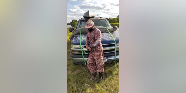 Once he was back on land, Hernandez took a series of photos with his catch, which happens to be his largest ever.