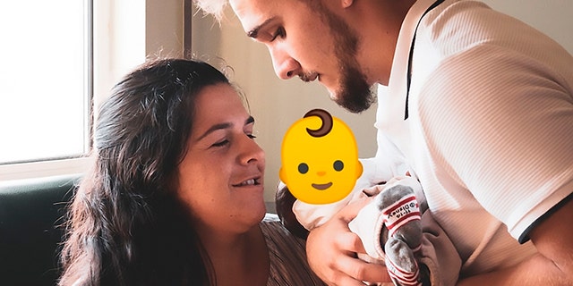 Marlene Simao and David Ribeiro, pictured with their son, whose face is covered, were unaware that their son would be born with several abnormalities.