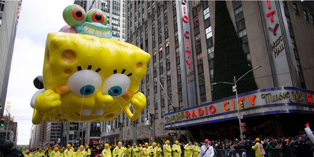 SpongeBob Square Pants & Gary balloon makes its way down Sixth Avenue during the Macy's Thanksgiving Day Parade, Thursday, Nov. 28, 2019, in New York. (AP Photo/Eduardo Munoz Alvarez)