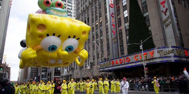 SpongeBob Square Pants & Gary balloon makes its way down Sixth Avenue during the Macy's Thanksgiving Day Parade, Thursday, Nov. 28, 2019, in New York. (AP Photo/Eduardo Munoz Alvarez)