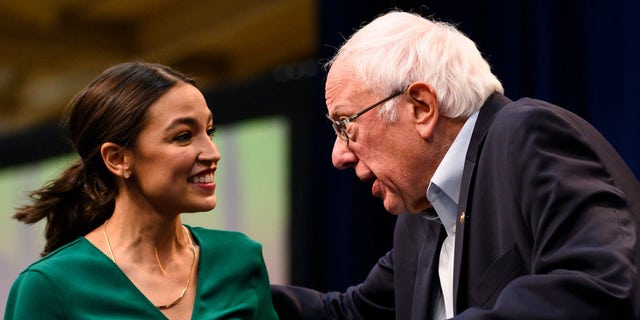 <br>
​​​​​​U.S. Rep. Alexandria Ocasio-Cortez, D-N.Y., is joined onstage by U.S. Sen. Bernie Sanders, I-Vt., in Des Moines, Iowa, Nov. 9, 2019. (Getty Images)