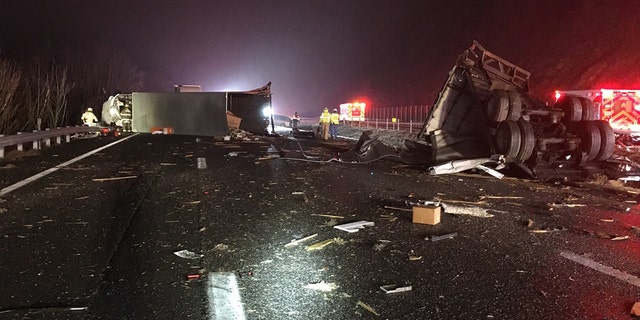 Damage to tractor-trailer can be seen after a multiple-vehicle crash on Interstate 64 in Virginia on Sunday.