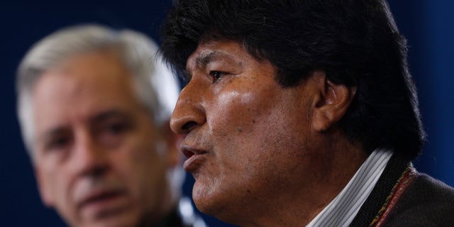 Bolivia's President Evo Morales speaks during a press conference at the military airport in El Alto, Bolivia, Saturday, Nov. 9, 2019. (AP Photo/Juan Karita)