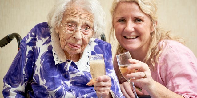 Flowers can no longer speak, but that doesn’t keep her from hanging out with the nursing home staff every day — something that also surely boosts her morale.