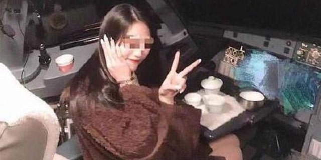 Pilot grounded as female passenger cockpit photo goes viral