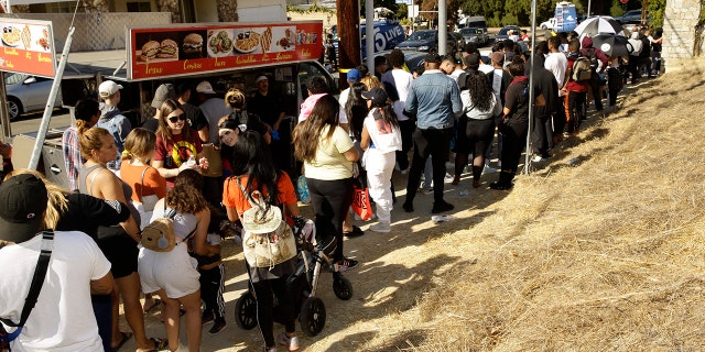 The singer posted a flyer on his Instagram and Twitter accounts that included his home address in the Tarzana neighborhood and says the event will start at 10 a.m Wednesday and go until 7 p.m.