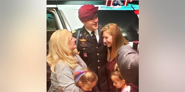 Army 1st Lt. Clint Lorance reunites with family members Friday after his release from a prison in Kansas following President Trump's decision to grant clemency. (Photo courtesy of Don Brown, attorney)