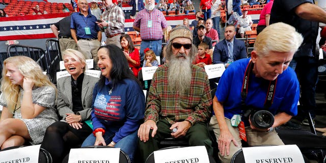 Phil Robertson, second from right, with wife Marsha 