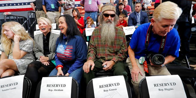 Phil Robertson, second from right, with wife Marsha
