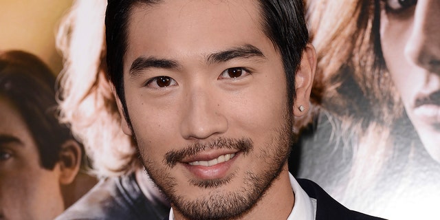 In this August 12, 2013, file photo, actor Godfrey Gao arrives at the world premiere of "The Mortal Instruments: City of Bones" at the ArcLight Cinerama Dome in Los Angeles. Gao has passed away while on set from an apparent heart attack.