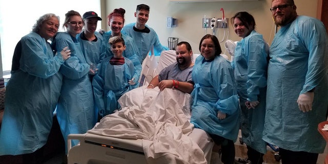The couple had an impromptu ceremony at the hospital the groom's father was being treated at.