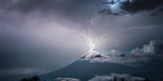 Lightning strikes the top of Volcán de Pacaya, an active volcano in Villa Canales, Guatemala in a recent storm.